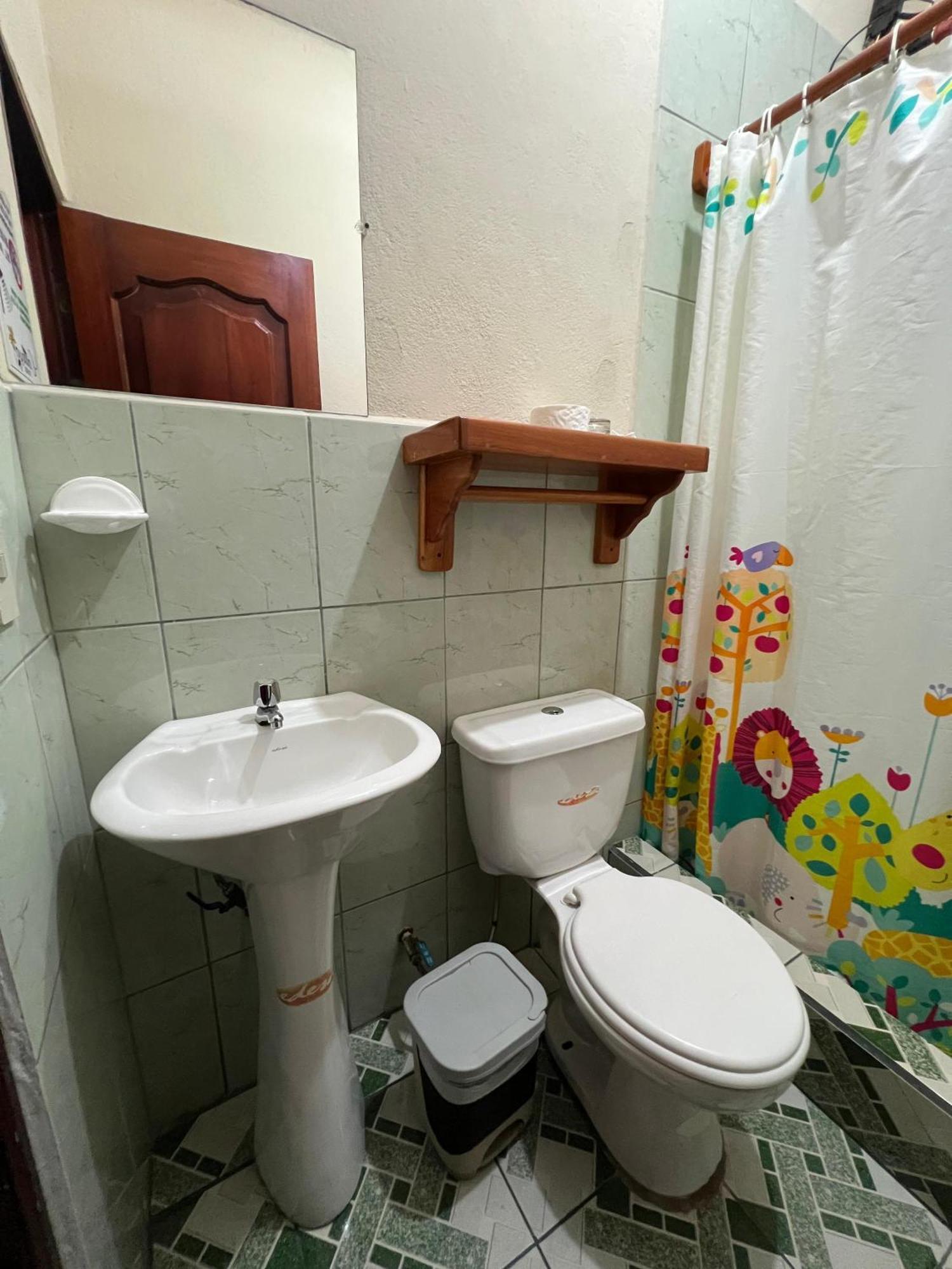 Hostal Cattleya Пуэрто-Бакерисо-Морено Номер фото